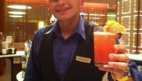 Cheers: Bartender Guillermo creates a tasty rum punch at the Conrad Condado Plaza hotel in Puerto Rico.
