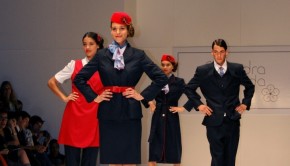 Aeromexico's flight attendant uniforms feature bold red accents.