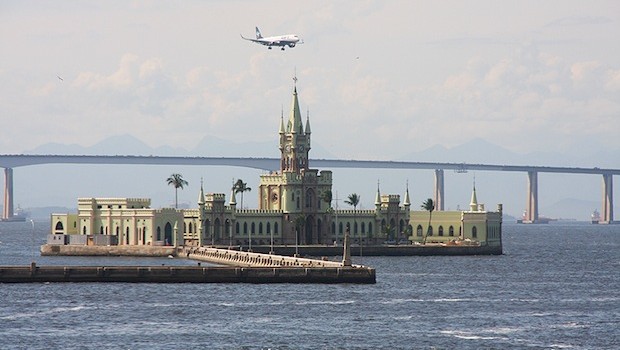 Azul Linhas Aereas (Azul Airlines) Embraer flying over Rio de Janeiro bay.