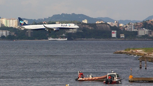 Azul Linhas Aereas (Azul Airlines) Embraer close to the water at Santos Dumont airport.