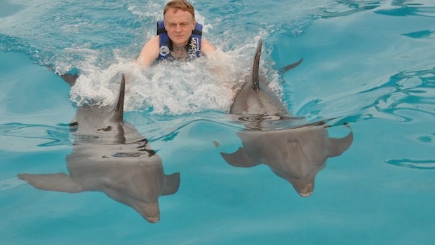 Not sure why I don't look happy during the Dolphin Dorsal Tow — I loved it!