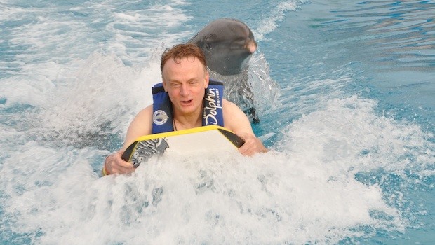 Dolphins going off duty after they give me a foot push at Dolphin Discovery Vallarta.