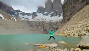 Caroline Michaud jumps for joy at Torres del Paine national park in Chile.