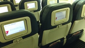 Airline seating & in-flight entertainment screens on Delta Air Lines 757.