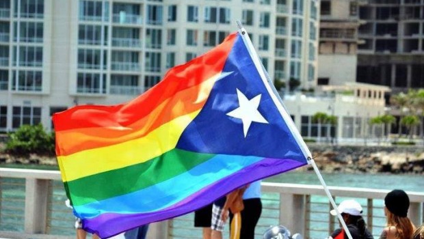A colorful hybrid of a rainbow flag and Puerto Rican flag.