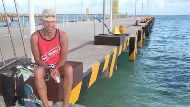 Angel awaits the ferry back to Cancun.