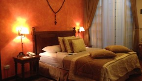 Guest bed at Hotel Patio Andaluz in Quito, Ecuador.