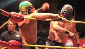 Lucha libre wrestling action at Arena Coliseo in Mexico City.