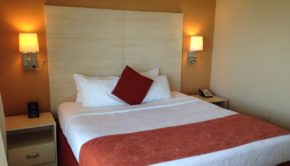 Suite bedroom at Best Western Plus Condado Palm Inn in Puerto Rico.