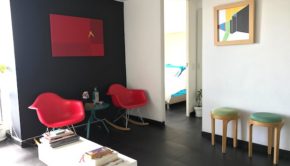 The mod decor at this Airbnb apartment in Bogota has splashes of color.